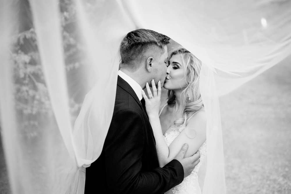 Couple embracing — timeless wedding photography Cape Town